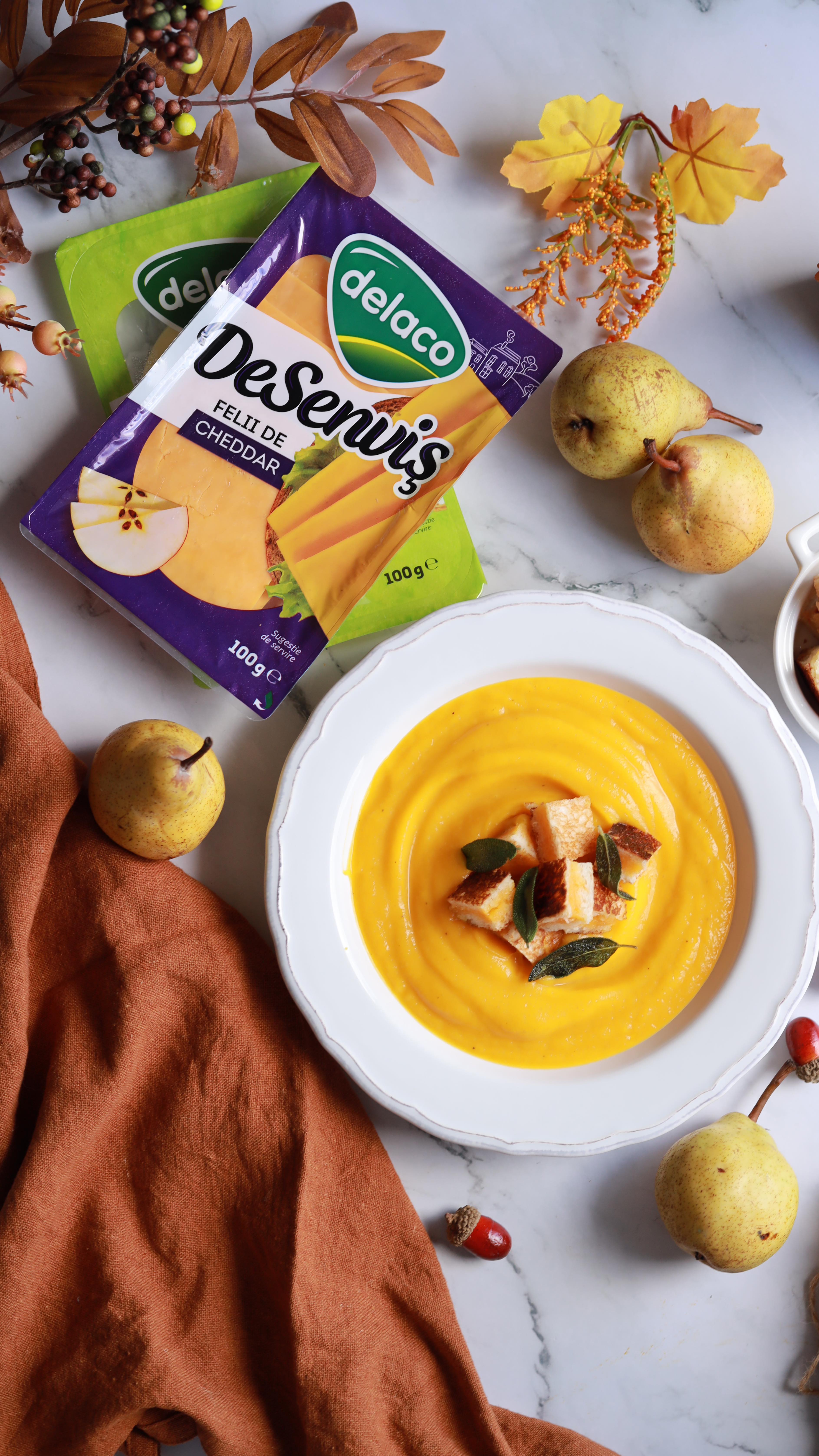 🧀Toată lumea știe supa de dovleac! Dar nimeni nu se așteaptă să pui în ea crutoane crocante, pline cu brânză topită! Hai să vezi cât de simplu se fac!Ingrediente pentru supa cremă de dovleac:
• 500 g dovleac copt
• 1 ceapă mică
• 1 pară dulce
• Sare, piper, după gust
• Apă
Pentru crutoane:
• Felii de pâine
• Felii Cheddar DeSenviș
• Felii Cașcaval DeSenviș
• Unt
Mod de preparare:
1. Încep cu dovleacul, pe care îl pun la copt. Când este gata, călesc o ceapă în puțin ulei. Adaug sare și o pară tăiată cubulețe, apoi torn puțină apă și pun piper.
2. Când ceapa și para s-au înmuiat, le pun împreună cu dovleacul copt în blender și adaug puțină apă, cât să obțin consistența dorită. Mixez și supa e gata.
3. Pentru crutoanele pline cu brânză, ung feliile de pâine cu unt pe toate părțile. Între ele pun câte două felii de Cheddar DeSenviș de la Delaco. Feliile de brânză DeSenviș se topesc perfect în orice sandviș cald!
4. Fac și crutoane cu cașcaval: le pun în panini maker câteva minute și apoi le tai cubulețe. Sunt perfecte de pus în supă, atât fierbinți, cât și reci!
👉 Follow pentru mai multe idei delicioase! #supa #retete #reteteromanesti #retetesimple